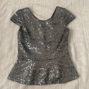 GB silver sequined top with cap sleeves.